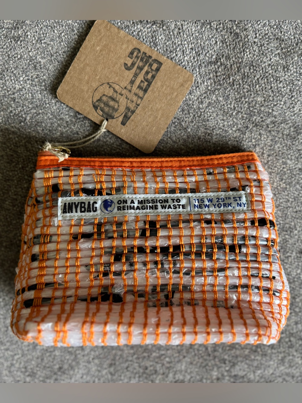 ANYBAG Recycled Trash Clutch